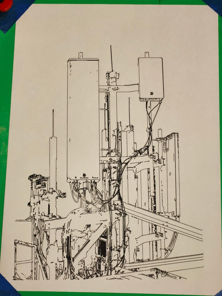 Line drawing of a complex industrial machine with various connected components and tubes.