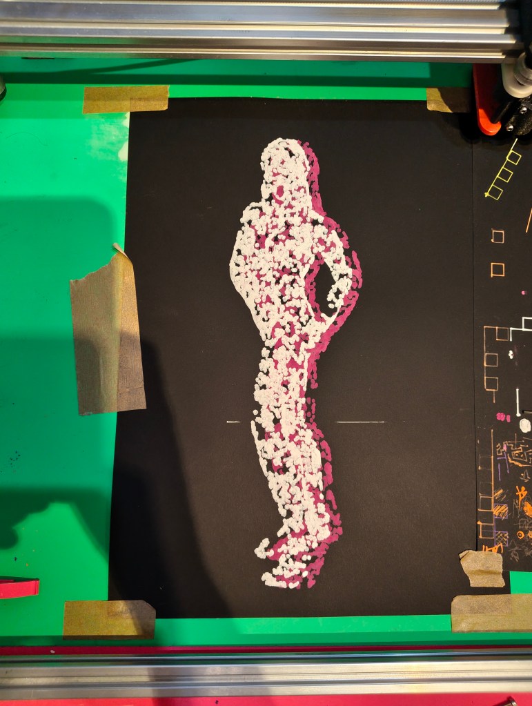 A silhouette of a standing figure created with white and pink materials on a black background, surrounded by green tape.